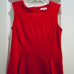 Calvin Klein orange peplum blouse